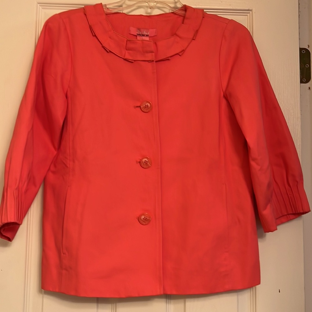Bright orange jacket by Du Joui